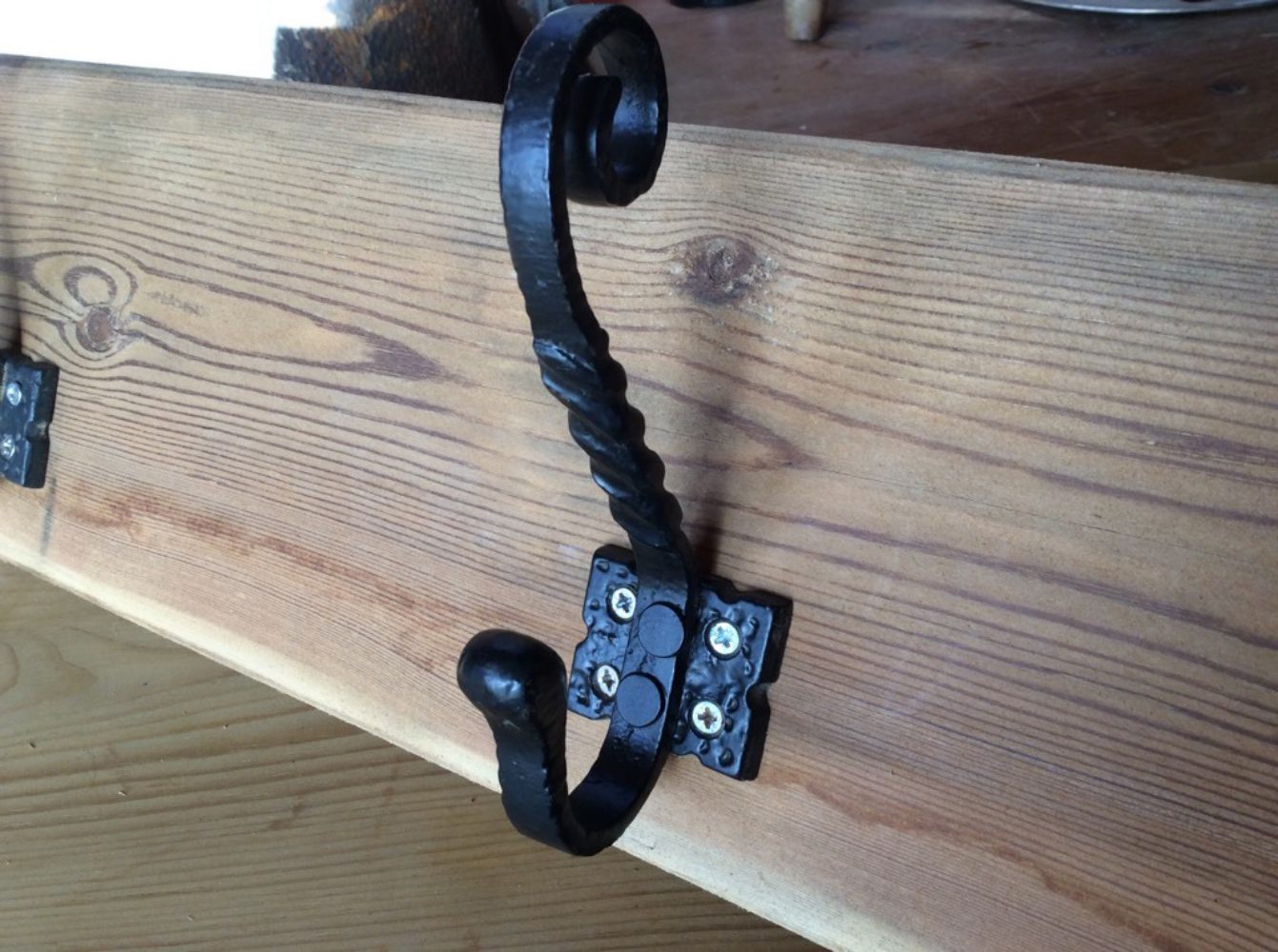 Three Old Wrought Iron Coat Hooks Mounted On Pine 26" Long