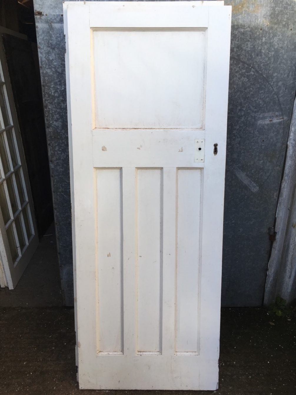 29 3/4”x76 5/8” 1930s Painted Pitch Pine Four Panel 1 Over 3 Internal Door