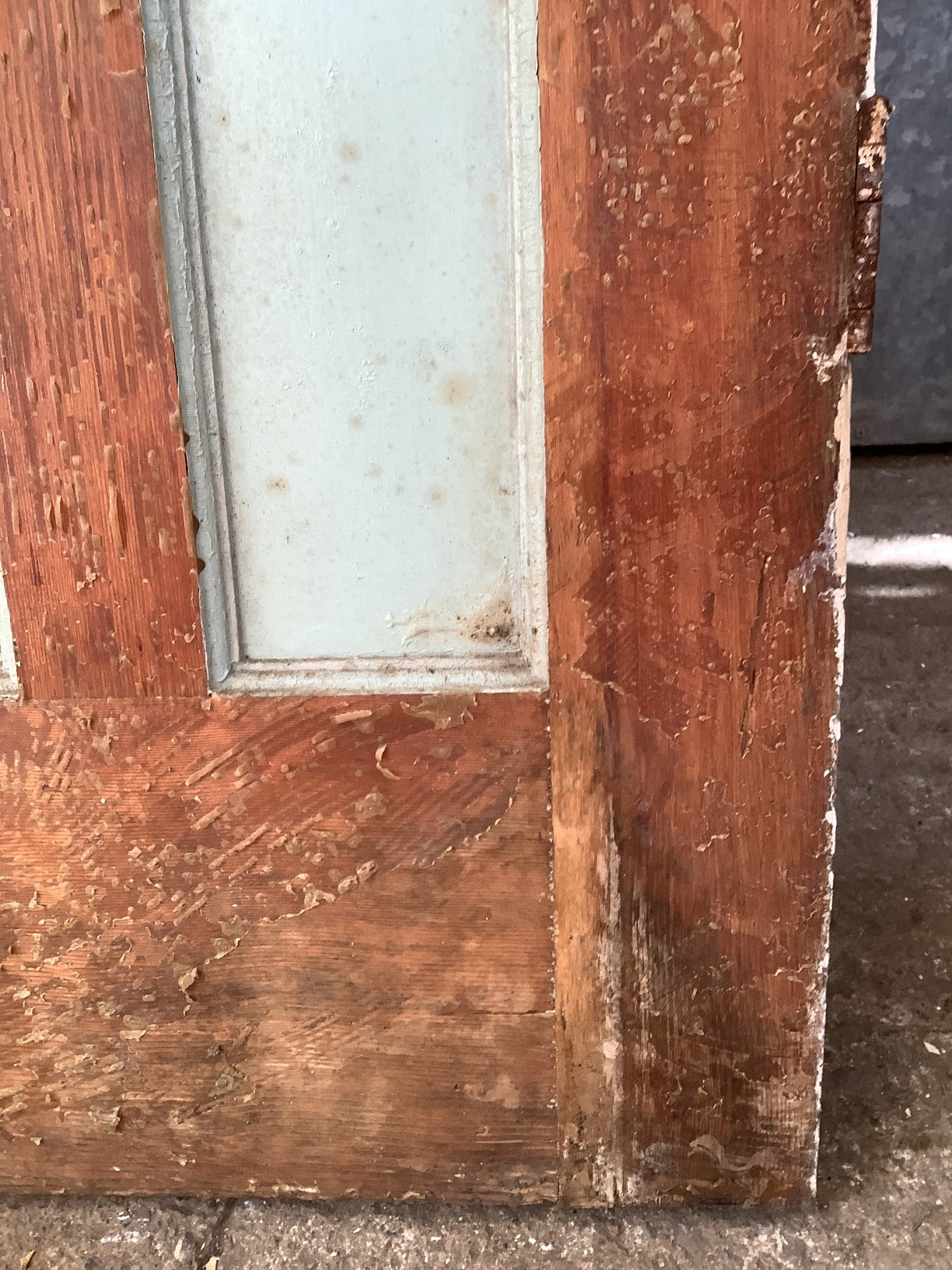 6th Picture showing old glue from a covering panel stick to the door