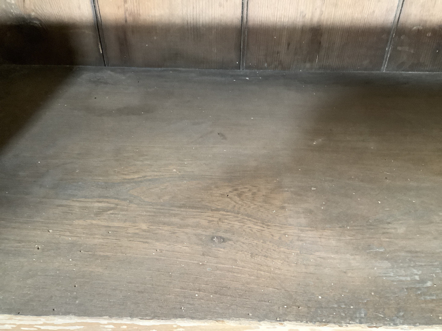 Old wood worm holes in shelf