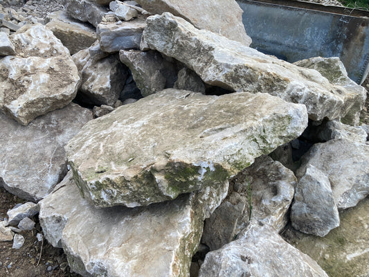 Enhance Your Landscape with Stunning Limestone Stones