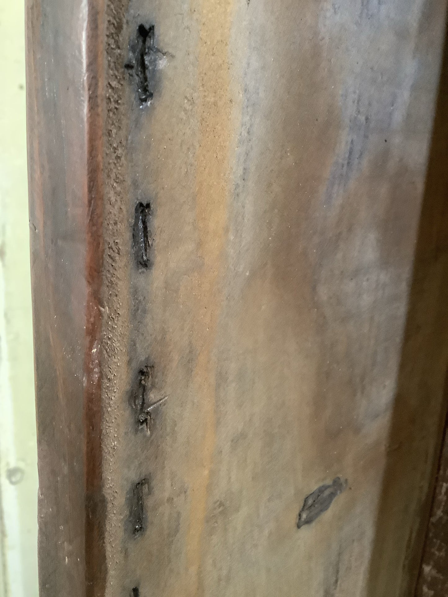 Old staple marks underneath on one side