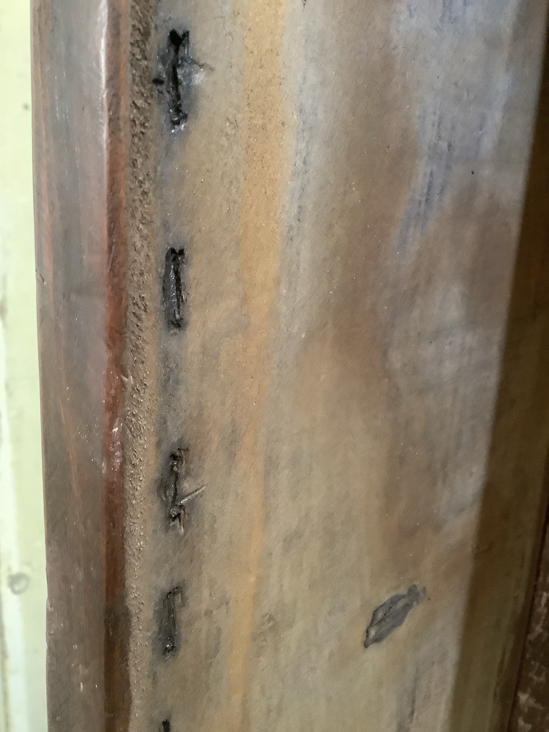 Old staple marks underneath on one side