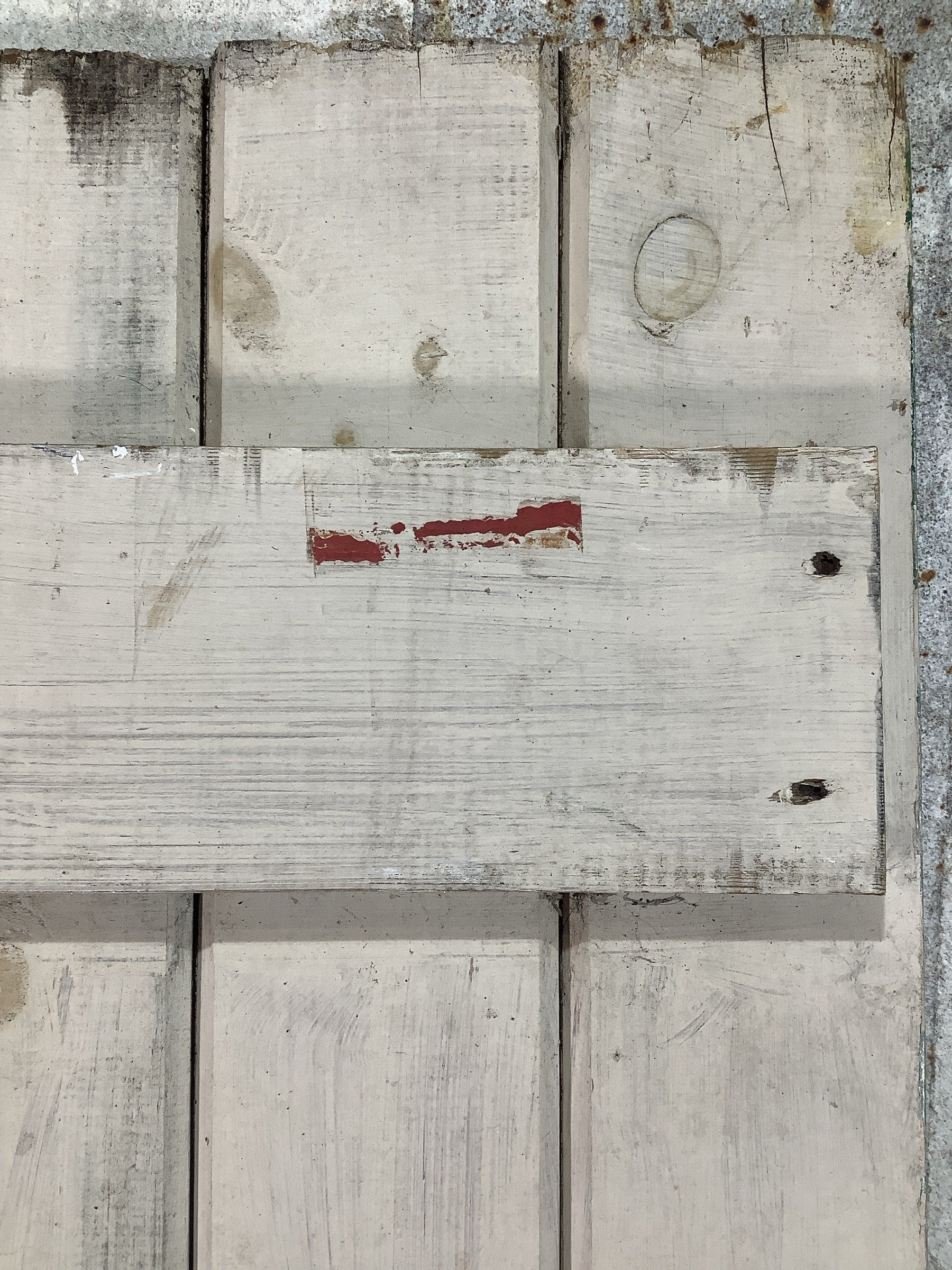 12th Picture showing red paint and uneven top