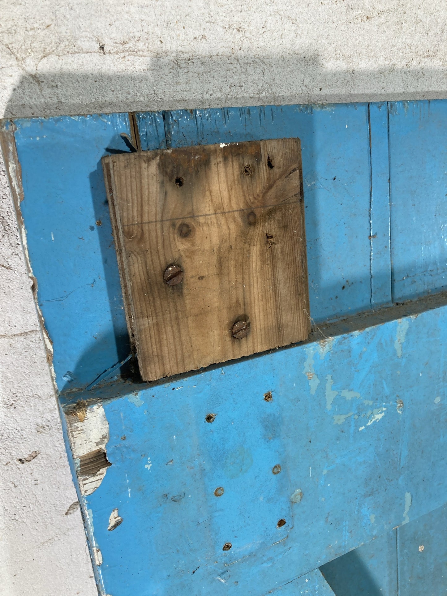 11th Picture showing block of wood from a bolt screwed to it once