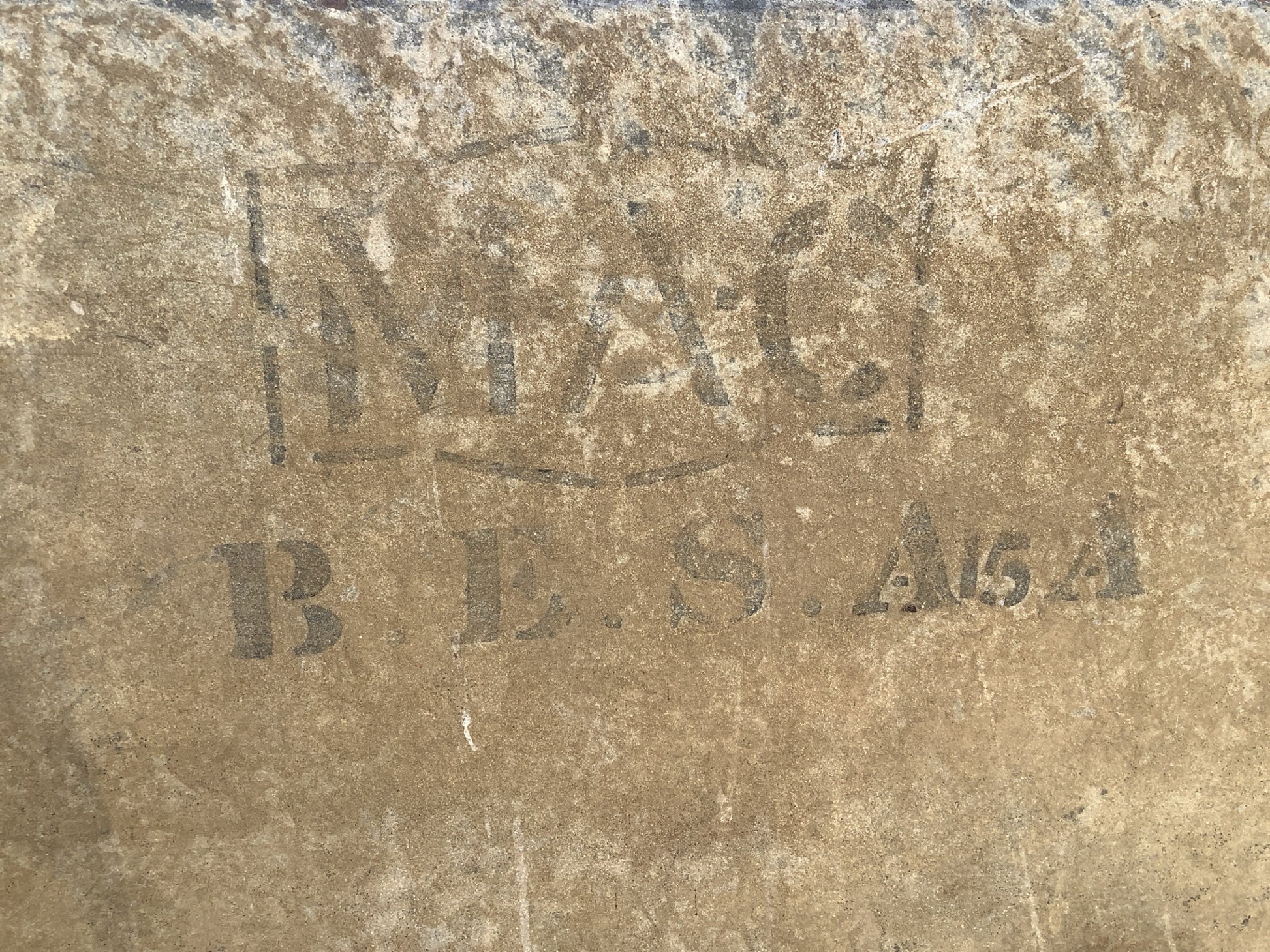 Stamped name and number