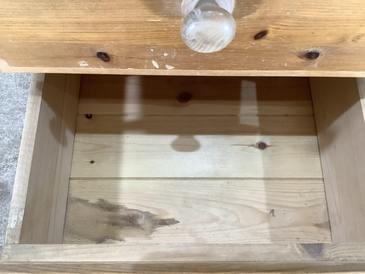 Stain on bottom drawer