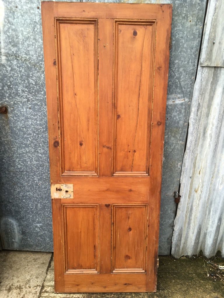 29 1/4x76 1/4” Reclaimed Victorian Varnished Pine 4 Panel 2 Over 2 Internal Door