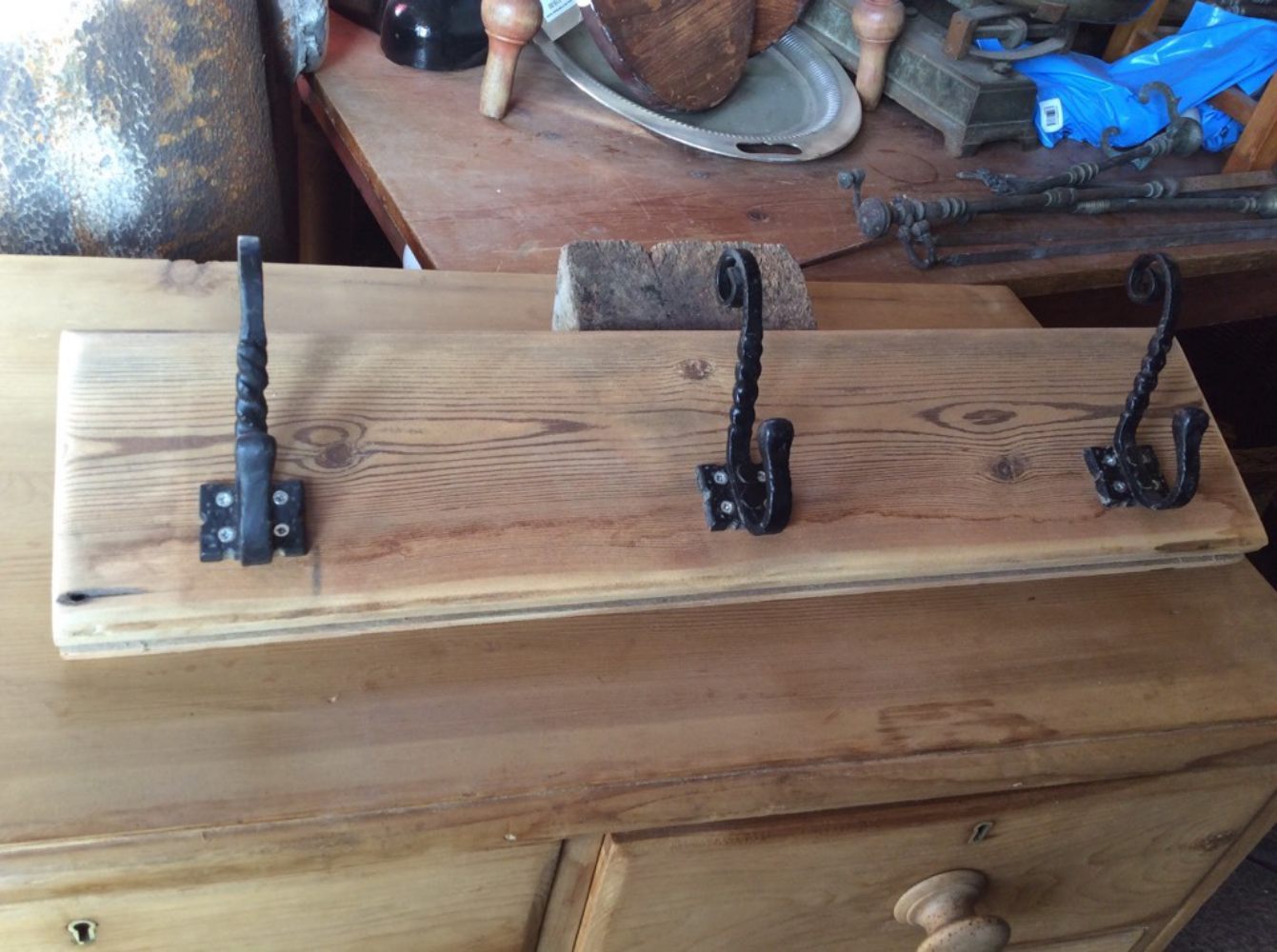Three Old Wrought Iron Coat Hooks Mounted On Pine 26" Long