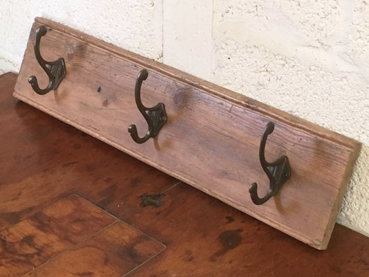 23 1/2" Interesting Old Reclaimed Pine Rack Of 3 Cast Iron Double Coat Hooks