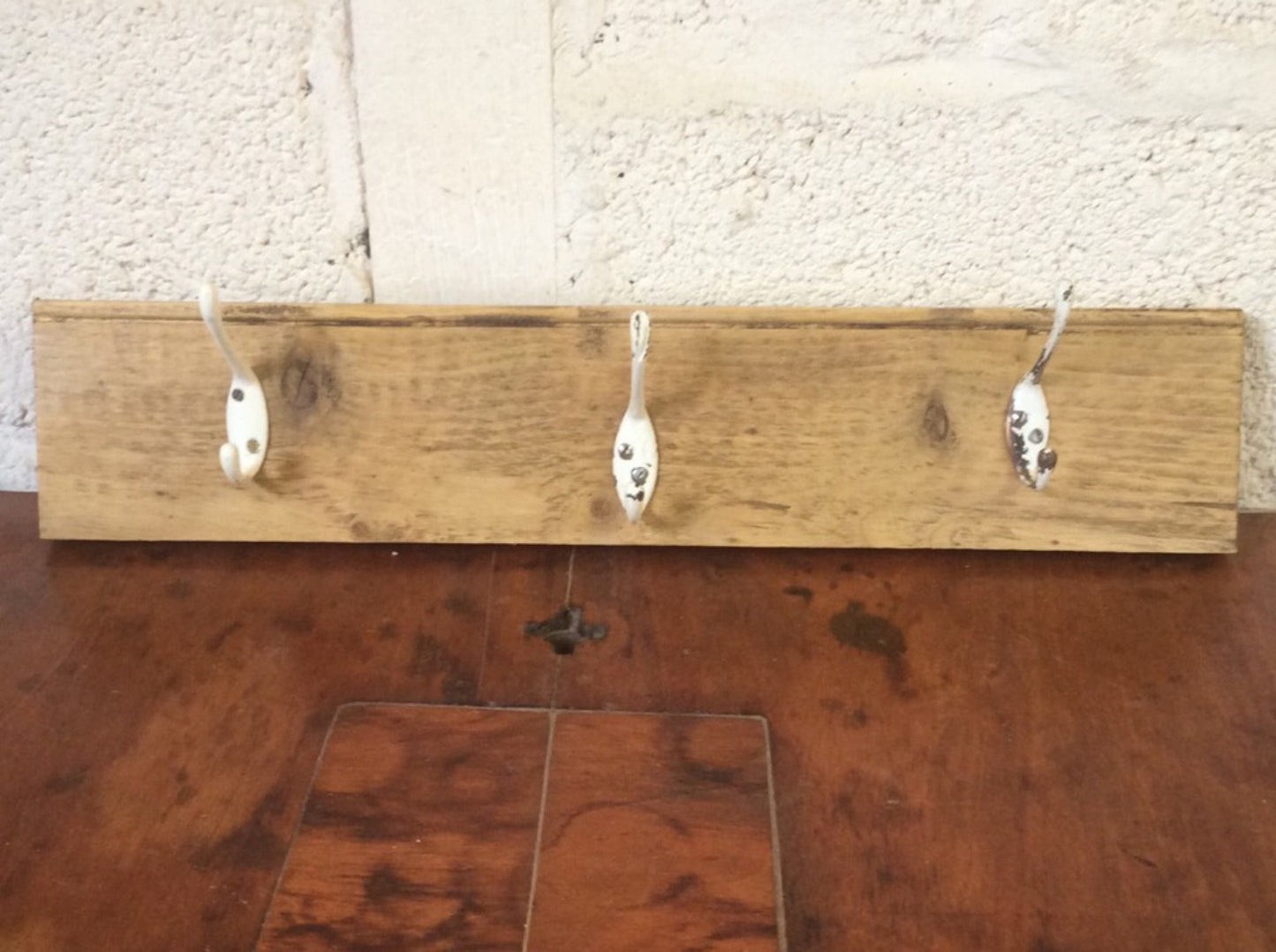 Interesting Reclaimed Old Pine Rack Of 3 White Cast Iron Double Coat Hooks